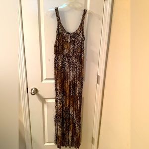 Leopard print maxi dress by Spence rows of shirring on the top and a 15” flounce